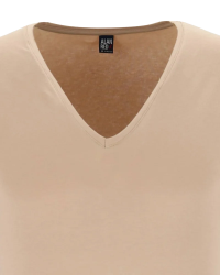 Deep V-neck detail of the men's skin-tone NOV T-shirt by Alan Red