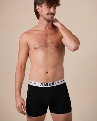 ull-length model wearing the Alan Red Lasting men's black boxer briefs