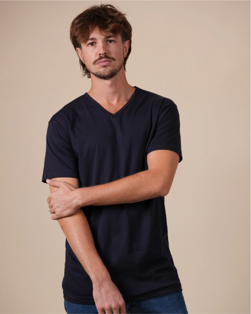 Alan Red Vermont men's navy blue short-sleeve V-neck T-shirt, front view worn by model with crossed arms.